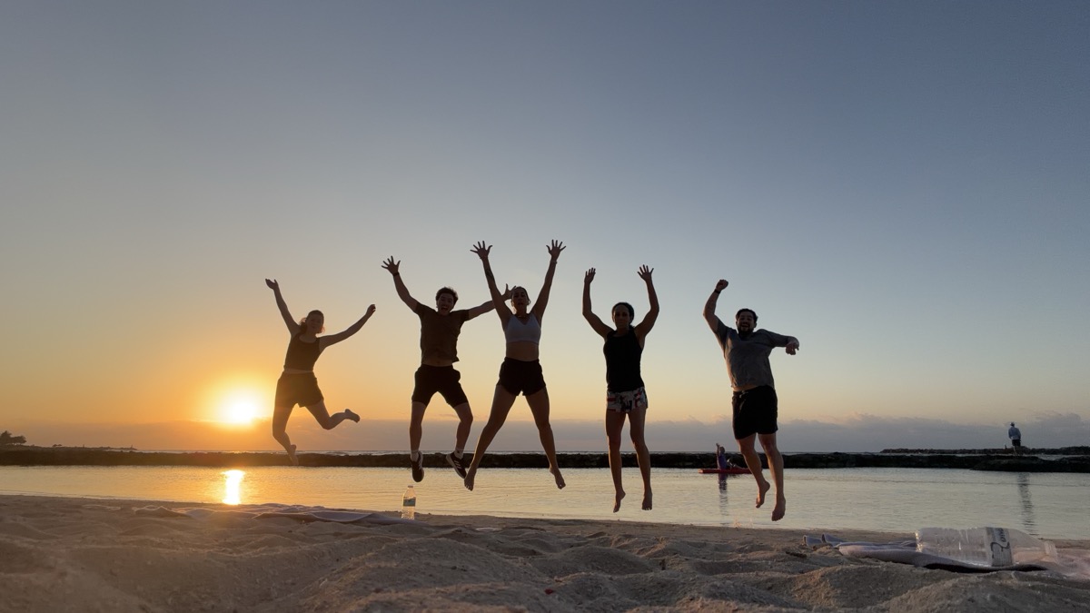 Qualia team on the beach